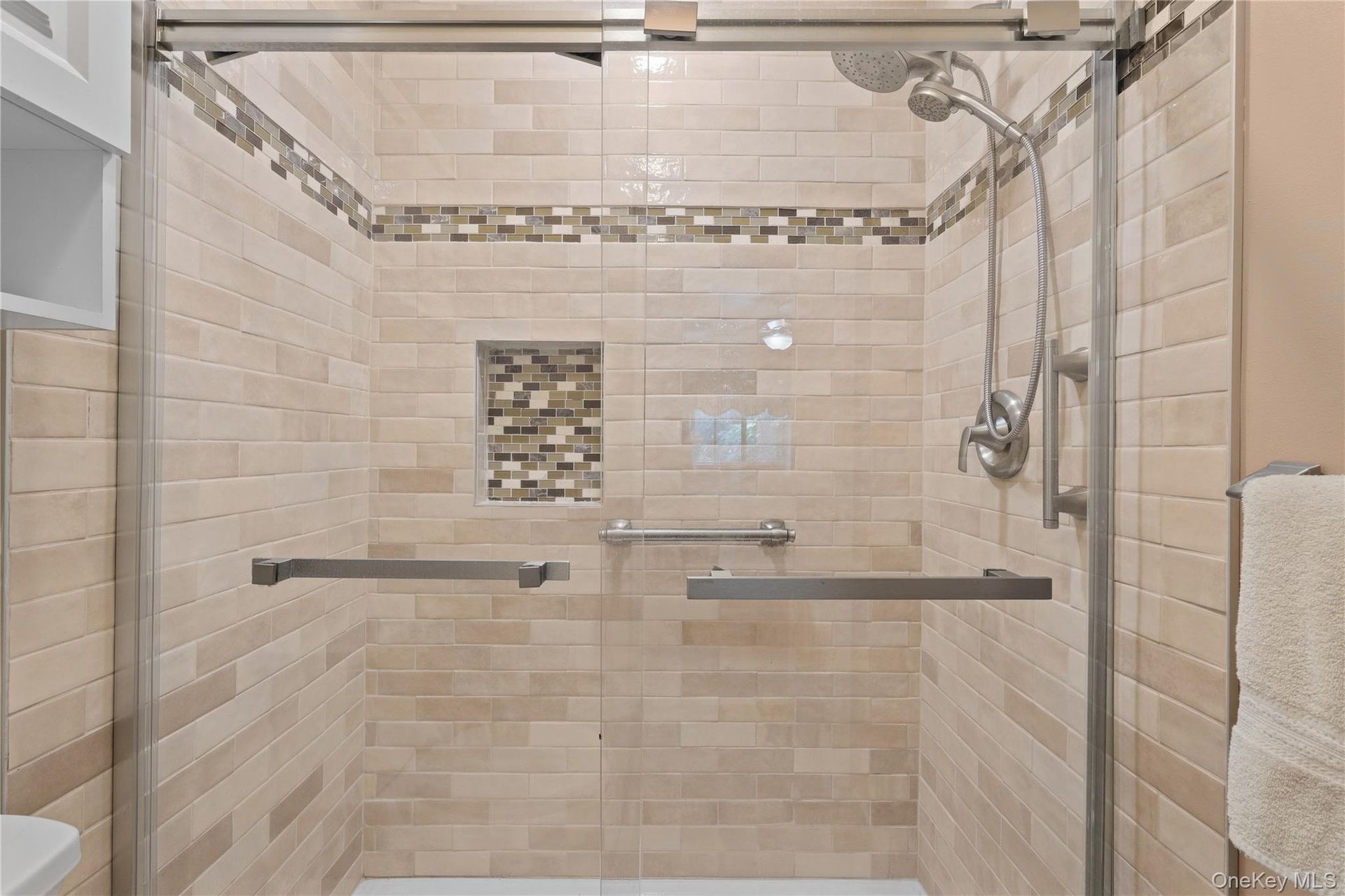 Renovated Primary Bath with double shower