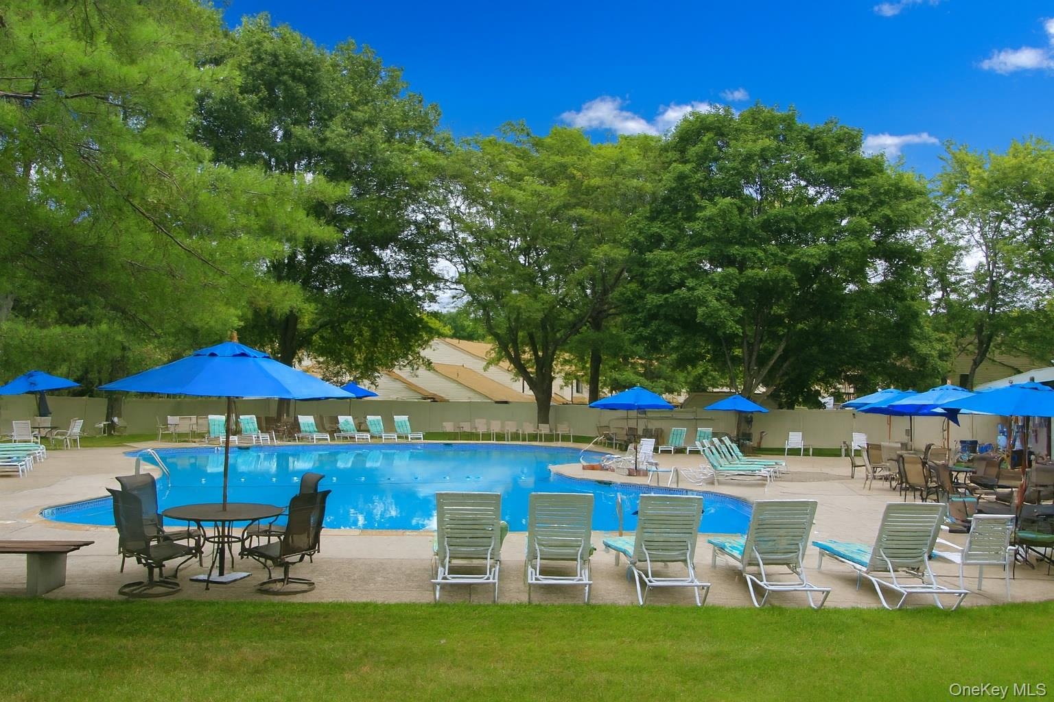 Enjoy the community outdoor pool where friends gather and enjoy cooling off or just relaxing.