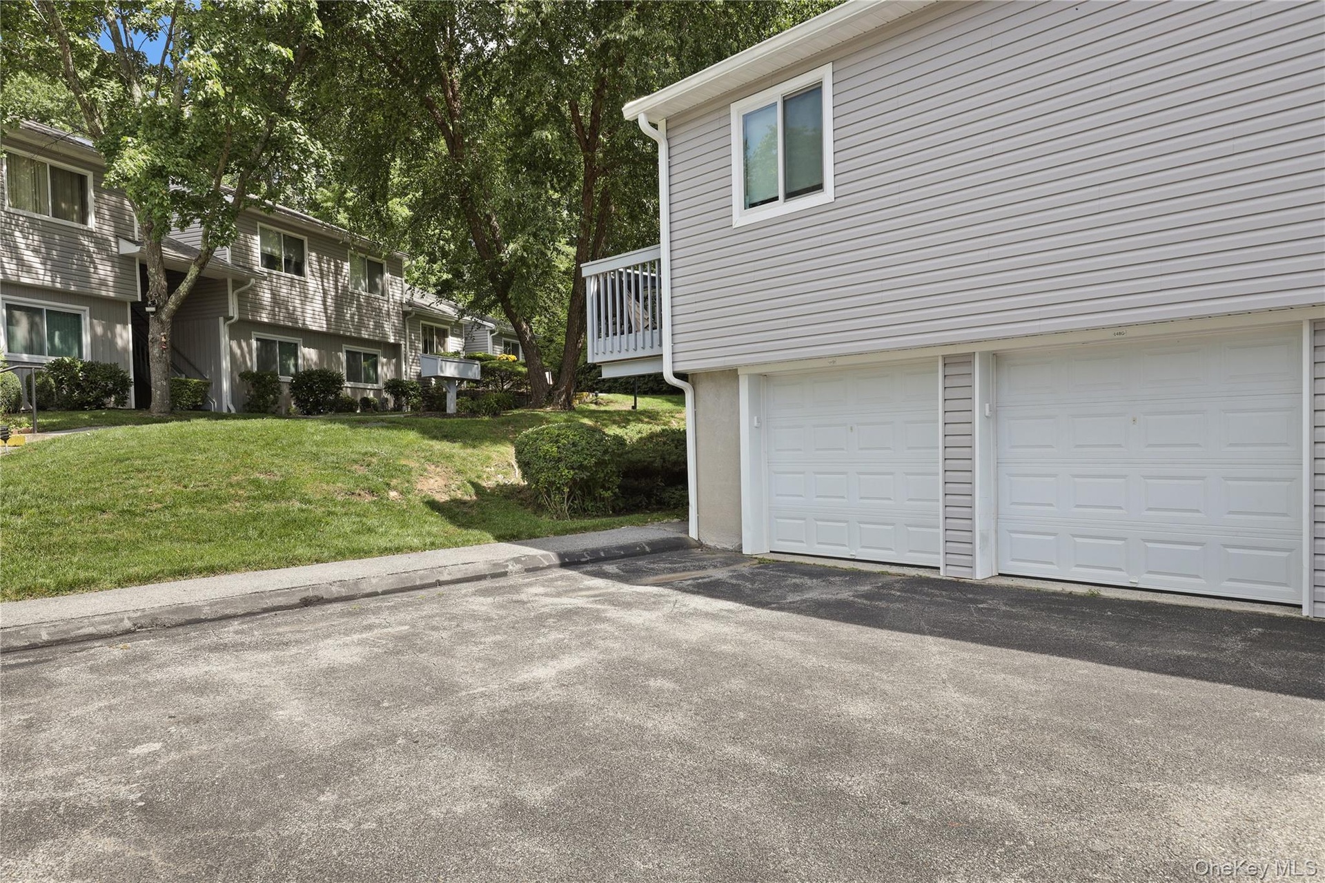 One Car Detached garage only a few steps away from condo