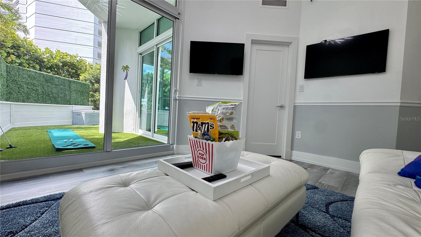 MEDIA ROOM DOUBLES AS A THIRD BEDROOM WITH A LARGE WALK-IN CLOSET