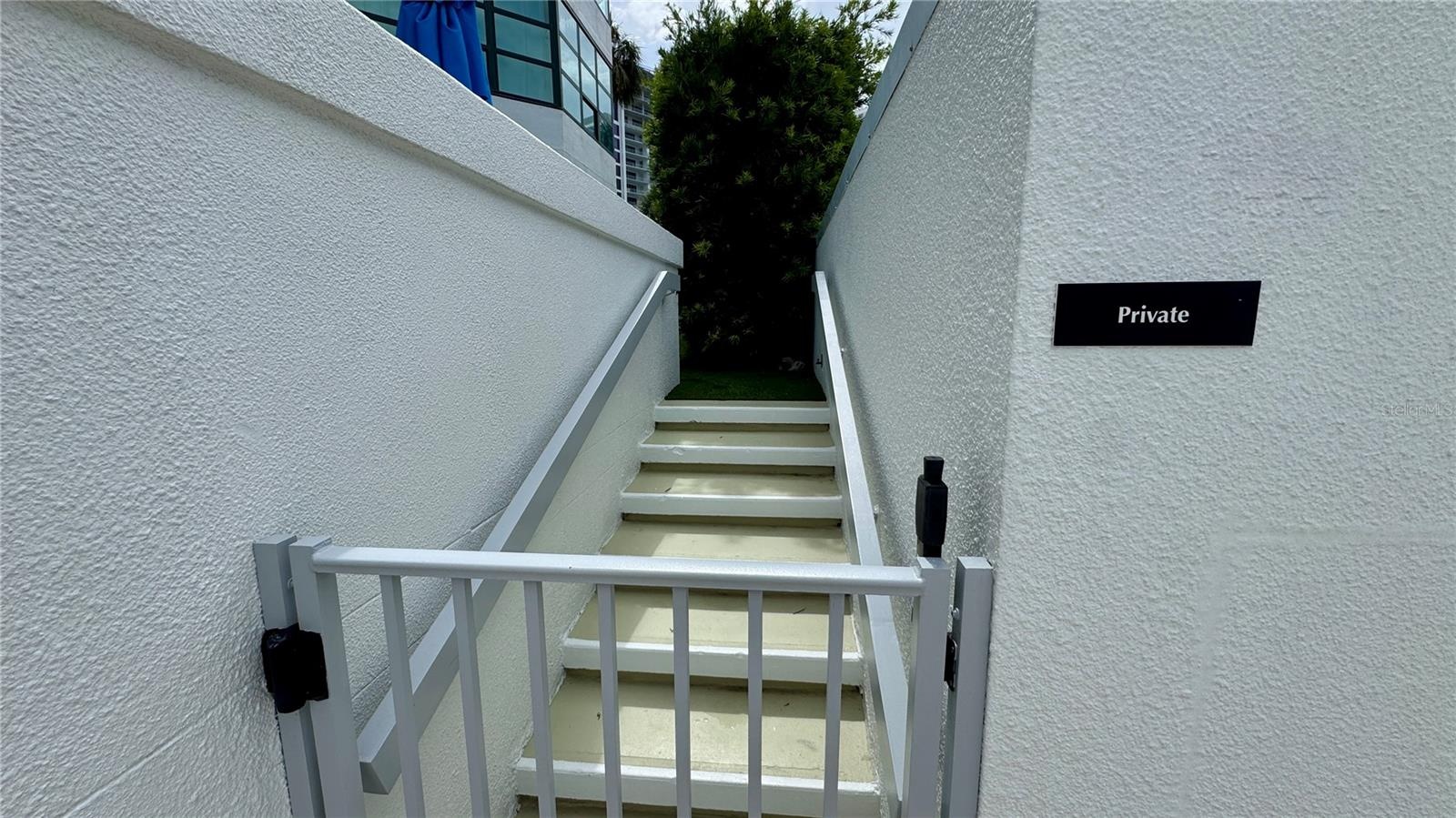 PRIVATE ENTRANCE GATE UP TO PRIVATE TERRACE