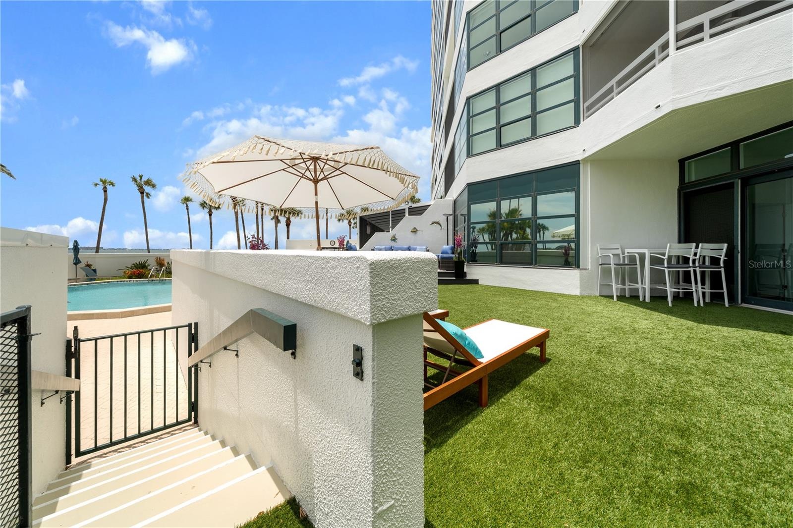 PRIVATE GATE DOWN TO AMENITIES...POOL, SAUNA, FITNESS, MARINA...