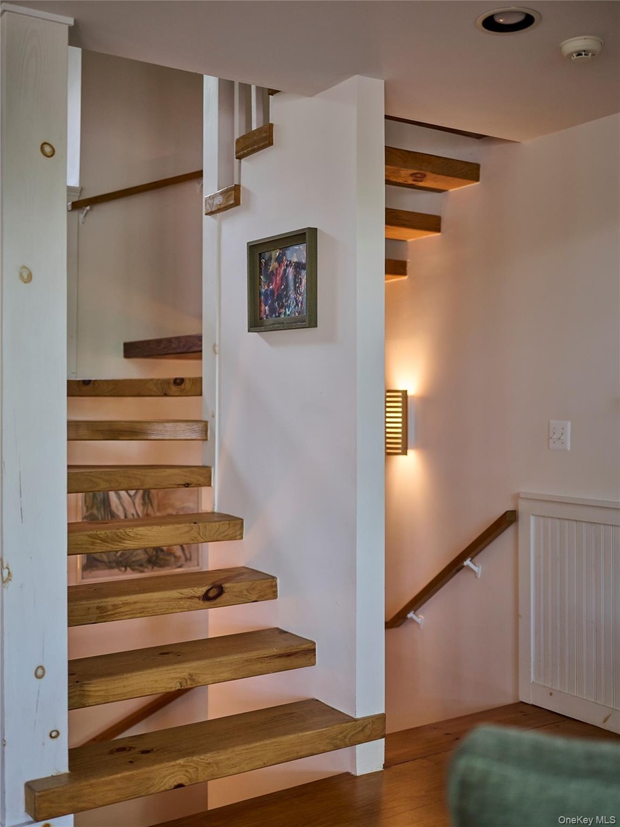 Stairs with wood finished floors