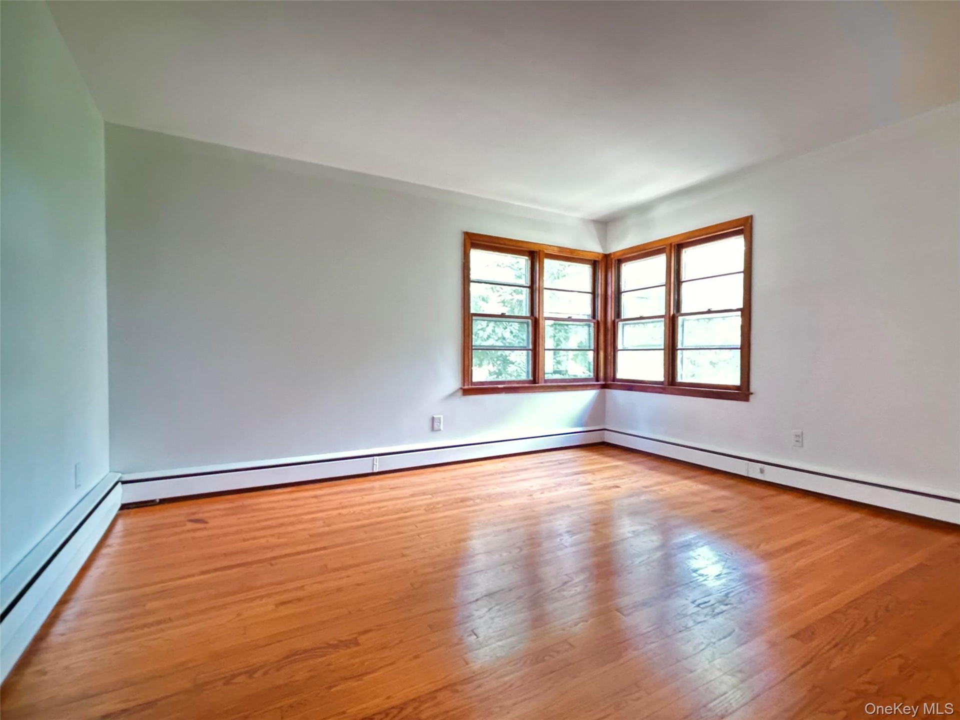 Primary Bedroom with lovely hard wood floor
