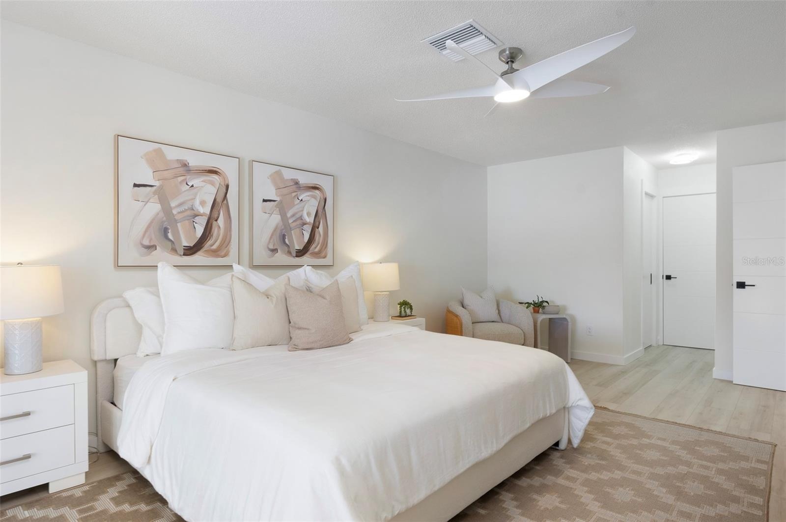Perfect Place to relax, sitting area, primary suite includes bathroom & walk-in closet by Closets by Design