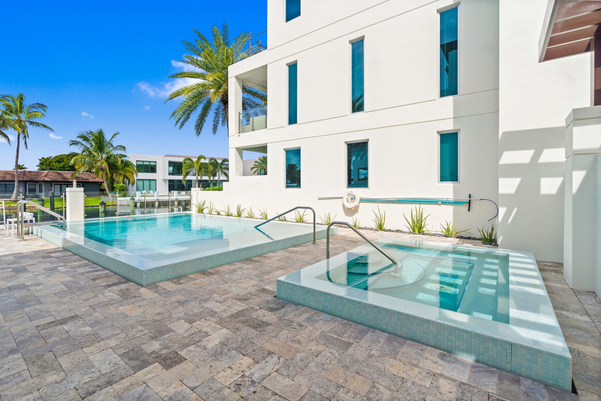 221 Shore Ct Community Pool. A remarkable luxury townhome rental that redefines upscale living in the heart of Lauderdale By The Sea. This beautifully