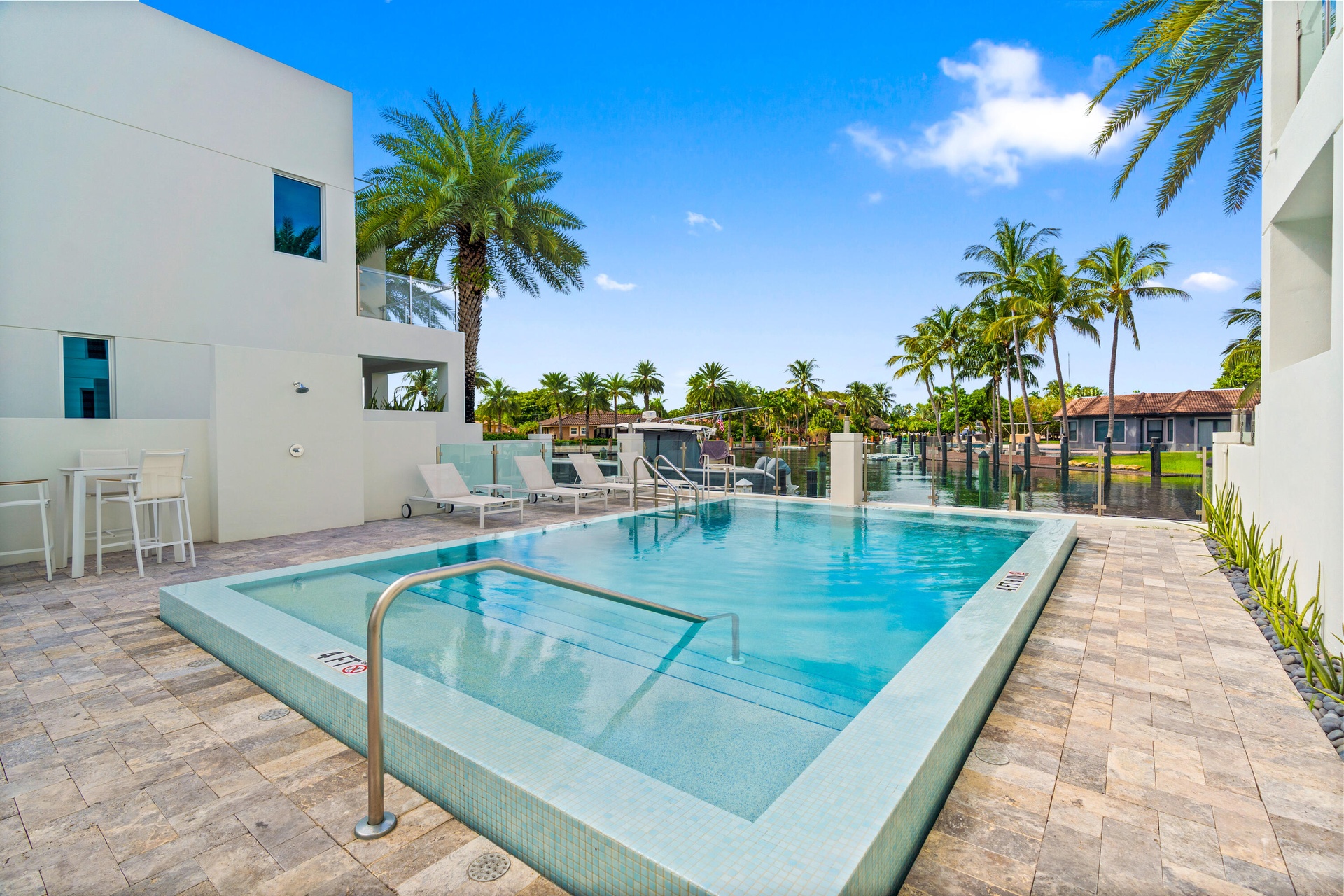 221 Shore Ct Community Pool. A remarkable luxury townhome rental that redefines upscale living in the heart of Lauderdale By The Sea. This beautifully