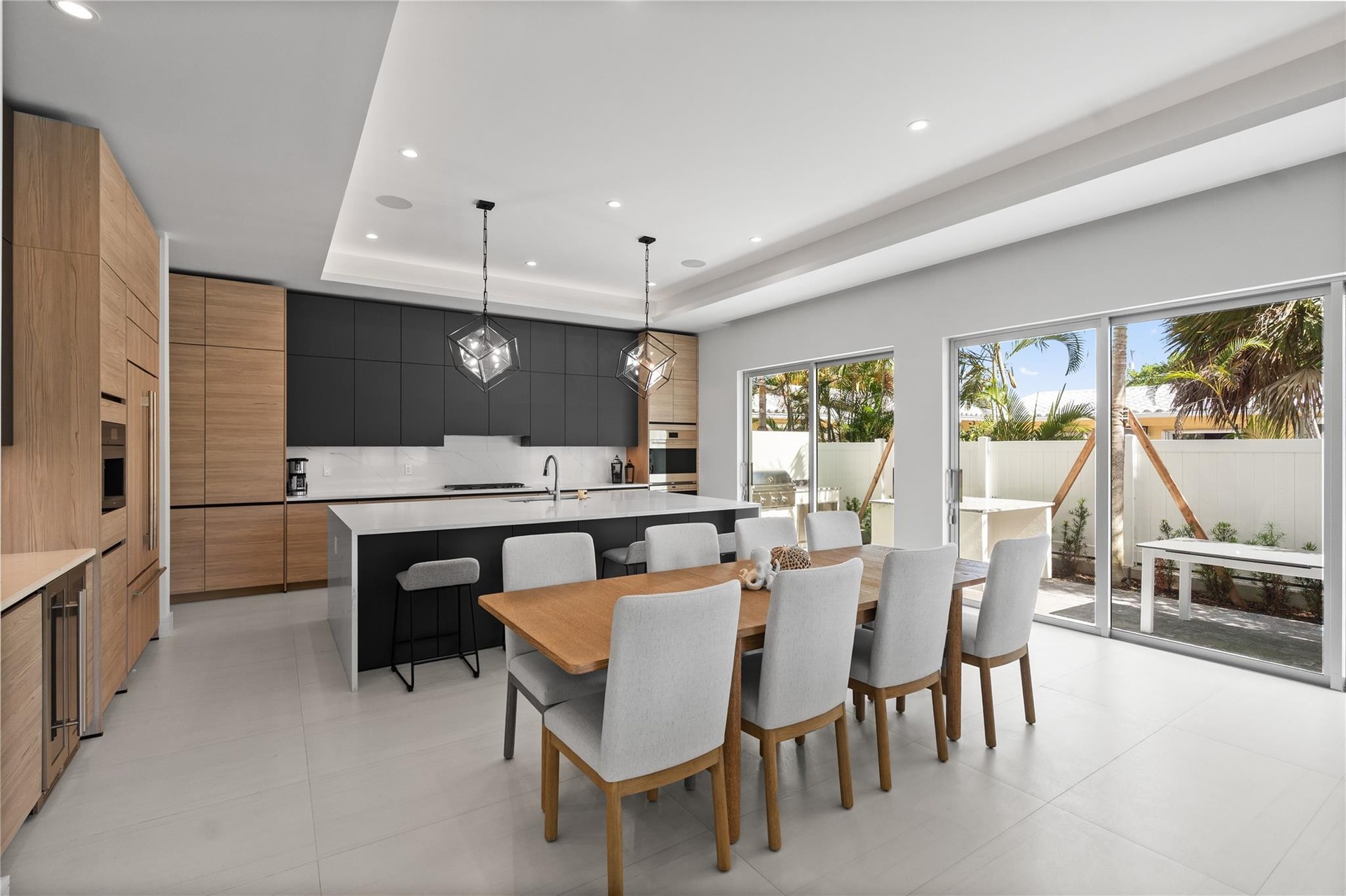 A custom designer kitchen with top of the line appliances, huge island, and tons of cabinetry storage. A remarkable luxury townhome rental that redefi