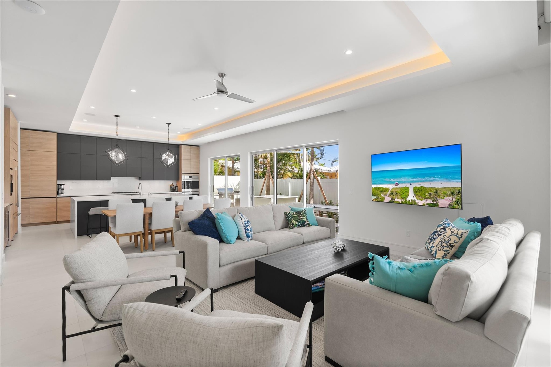 Open concept living area and kitchen - A remarkable luxury townhome rental that redefines upscale living in the heart of Lauderdale By The Sea. This b