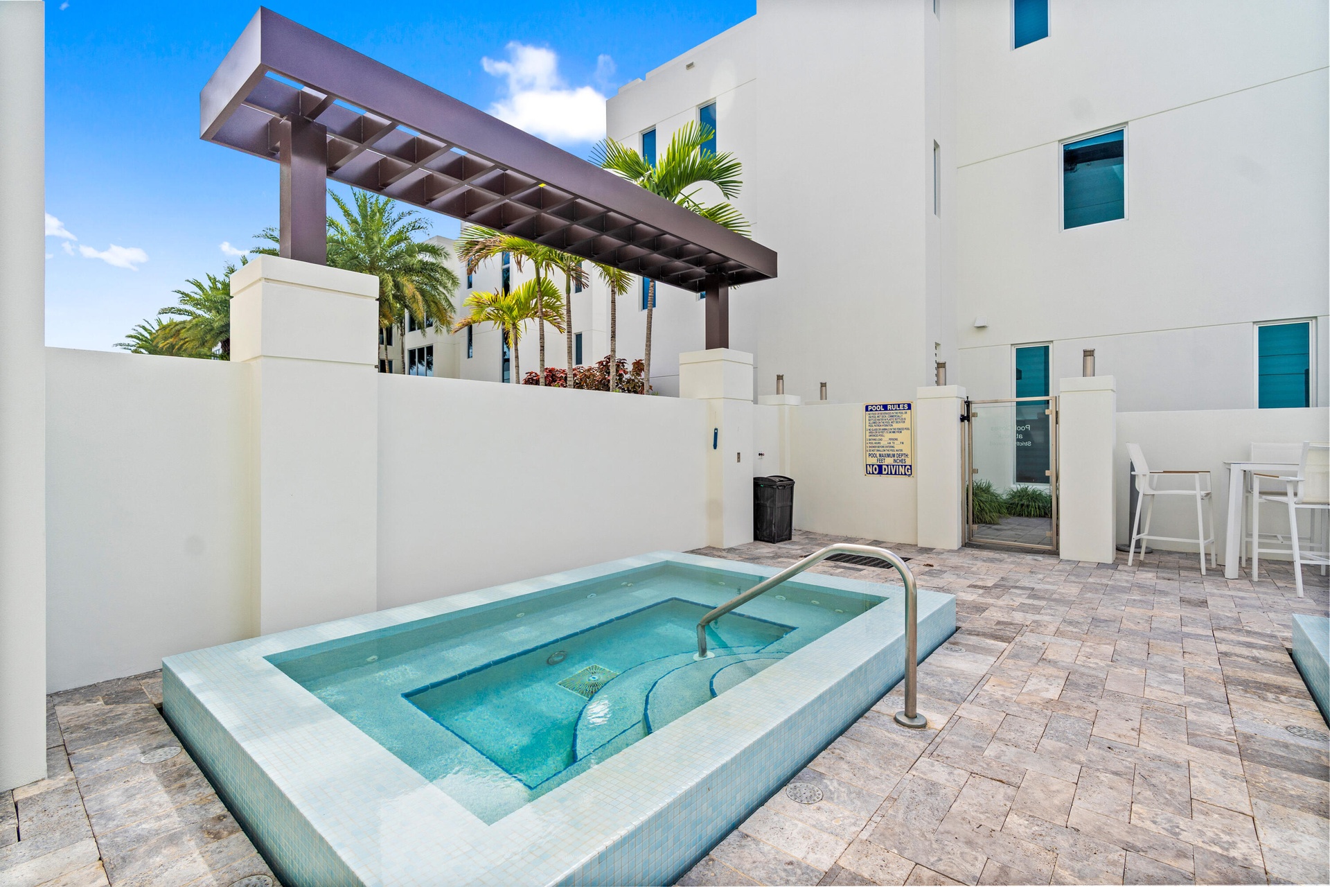 221 Shore Ct Community Pool. A remarkable luxury townhome rental that redefines upscale living in the heart of Lauderdale By The Sea. This beautifully
