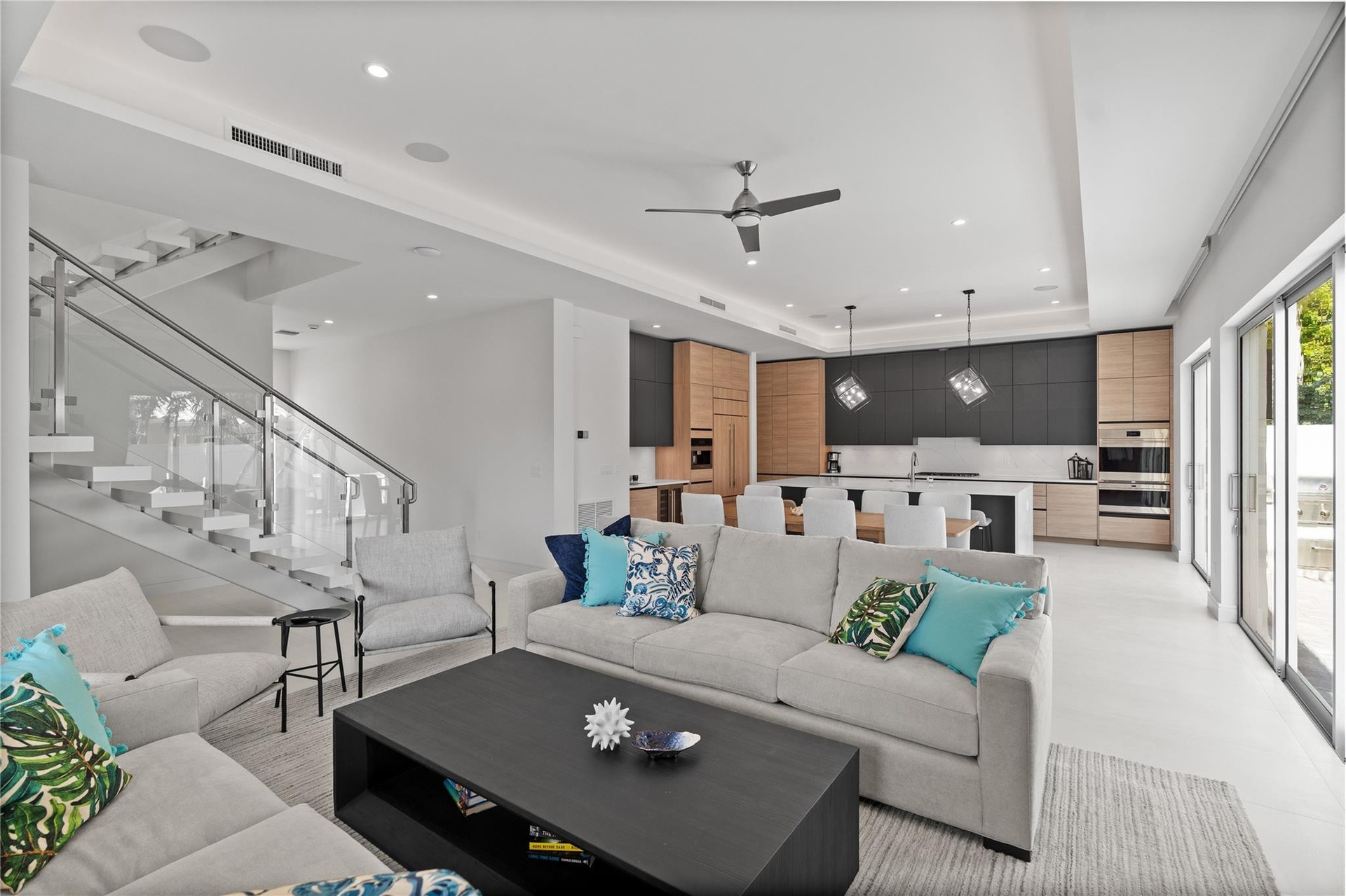 Open concept living area and kitchen - A remarkable luxury townhome rental that redefines upscale living in the heart of Lauderdale By The Sea. This b