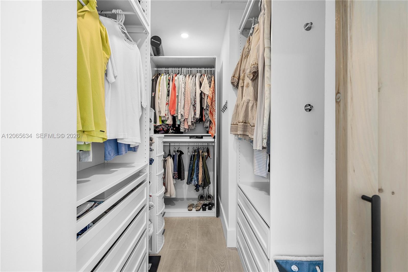 CUSTOM WALK IN CLOSET WITH CUSTOM BUILT INS