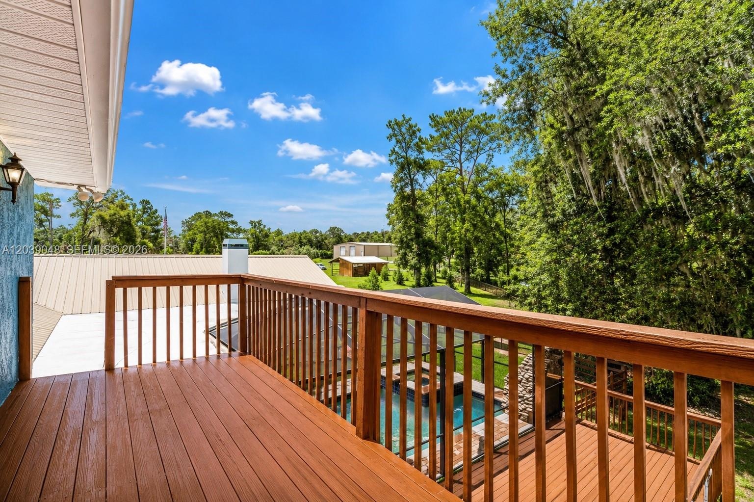 Comfortable exterior deck space designed for relaxation and seamless indoor-outdoor living.
