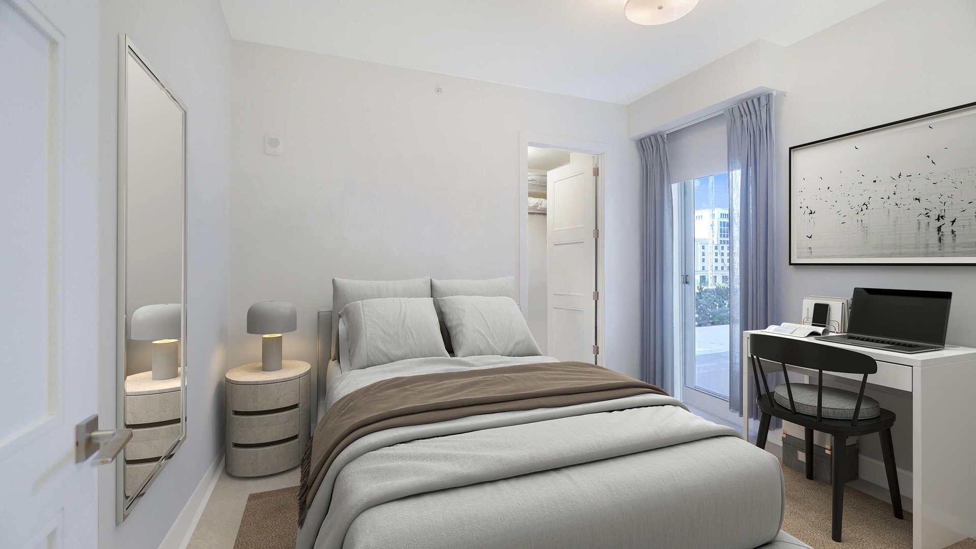 Guest suite with a dedicated workspace and direct access to the residence’s outdoor living. VIRTUALLY STAGED.