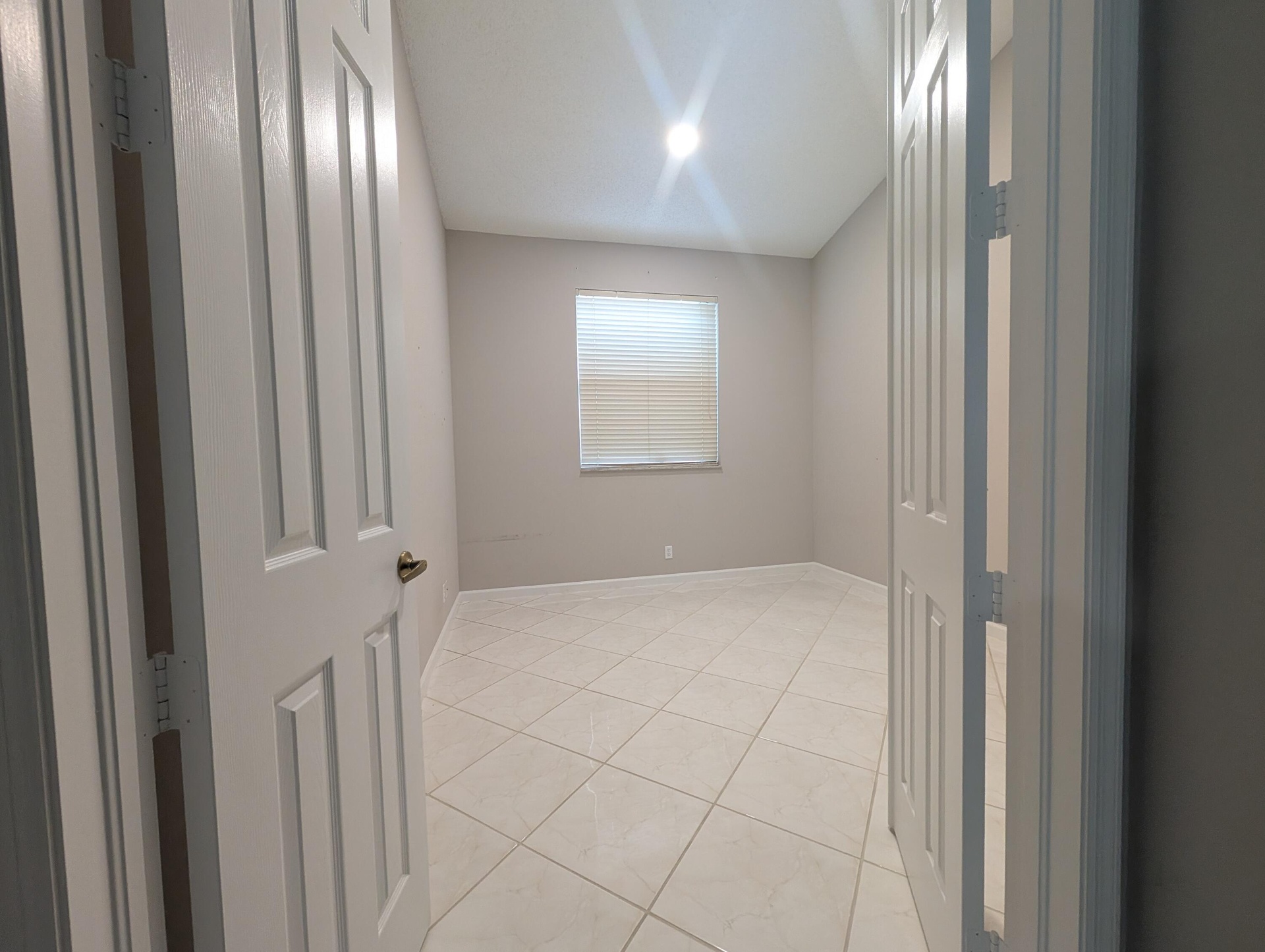 French Door entry on comfortable sized 3rd bedroom