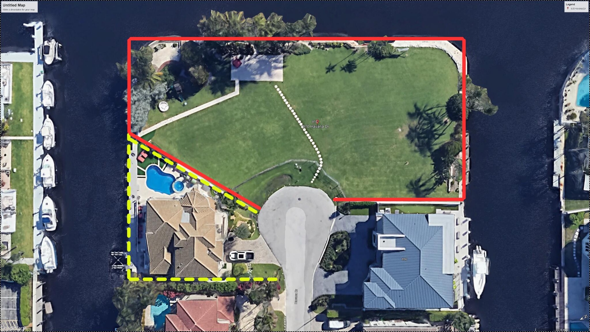 Aerial view of 870 Havana Drive with adjacent 857 Havana Drive residence, illustrating the potential combined three-lot waterfront property with exten