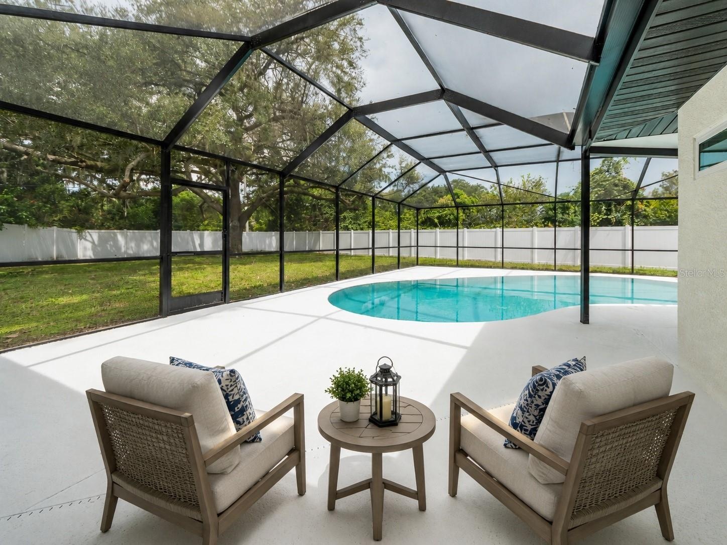VIEW OF POOL AND BACKYARD