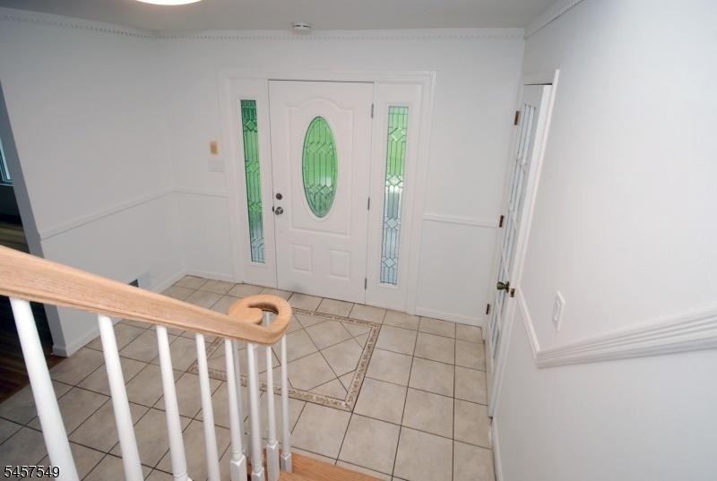 Entry with tile floor