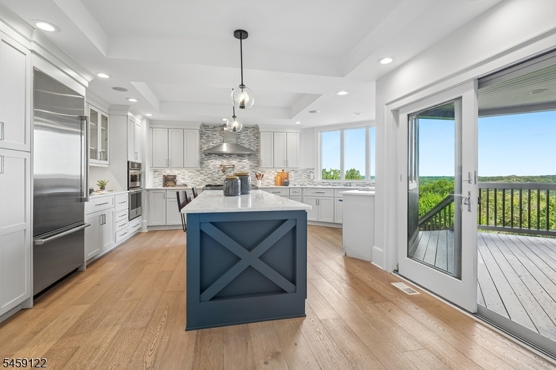 Kitchen w/ door to deck