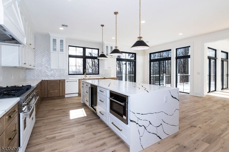 Kitchen with waterfall island