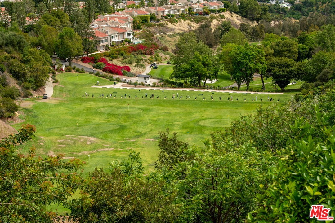watch the golfers on the drivi