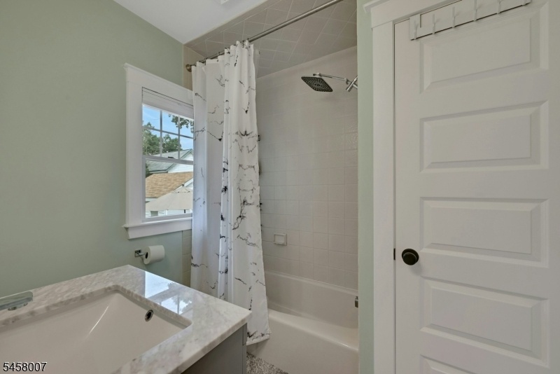 Shower over tub/linen closet