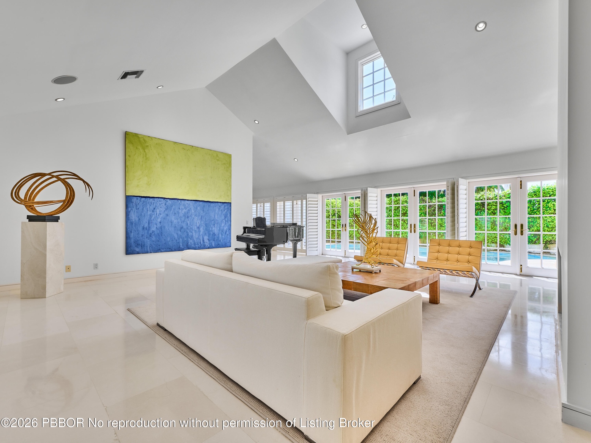 Soaring ceilings and expansive French doors, create a light-filled interior, with crisp lines and refined finishes bringing a distinctly modern sensib