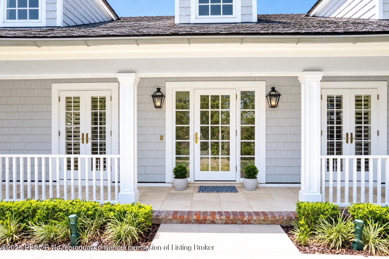 Classic French doors complementing the timeless Coastal Colonial Architecture