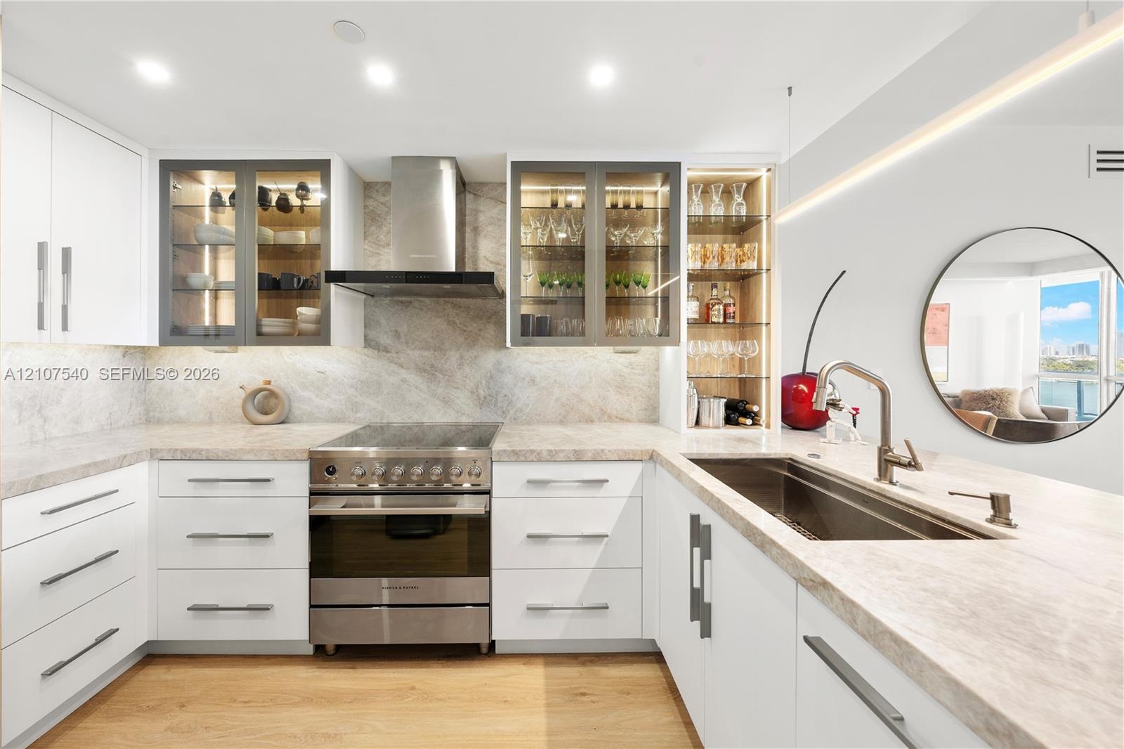 Professionally remodeled gourmet Kitchen with top of the line Fisher & Paykel appliances