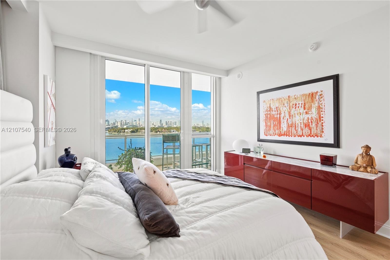 Master Bedroom with beautiful downtown Miami skyline views + Star Island
