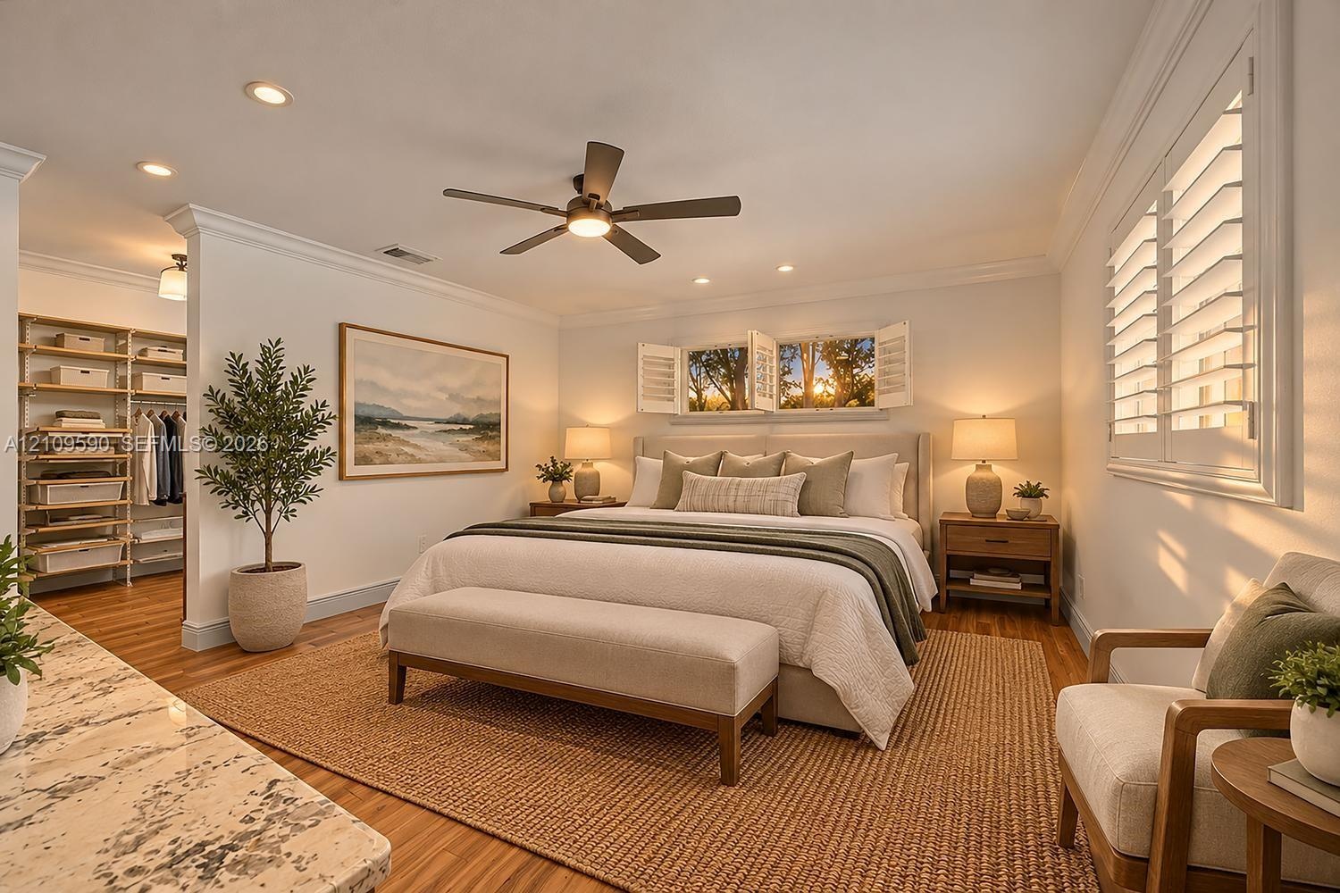 Wood-finish flooring, recessed lighting, ceiling fan, interior plantation shutters, and a built-in open closet system