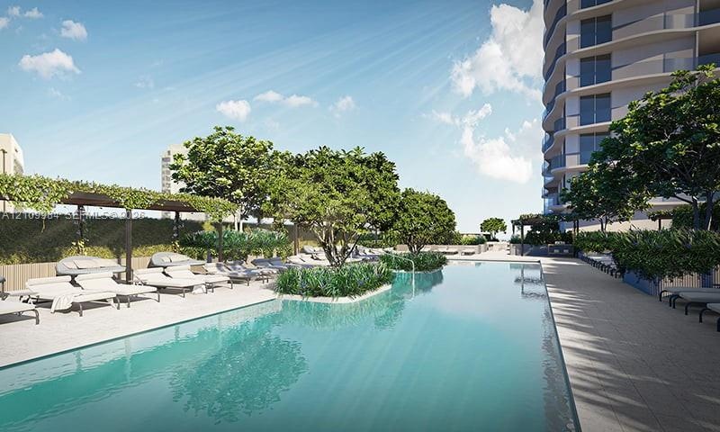 Swimming pool with central landscaped island, stone-tiled deck, and pergola structures