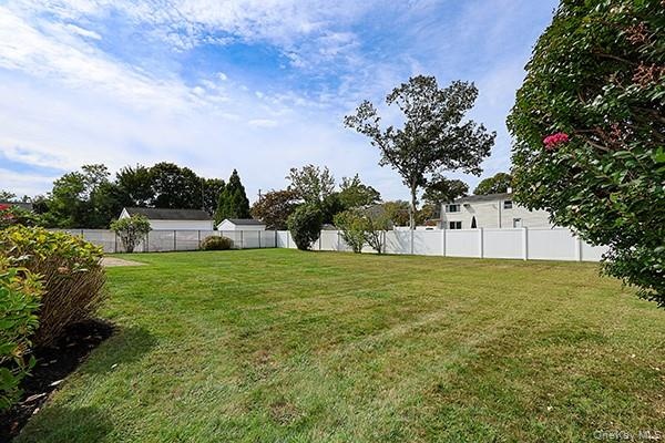 View of fenced backyard