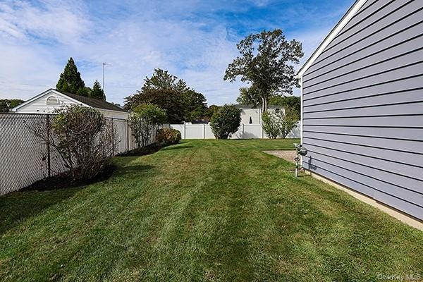 View of fenced backyard