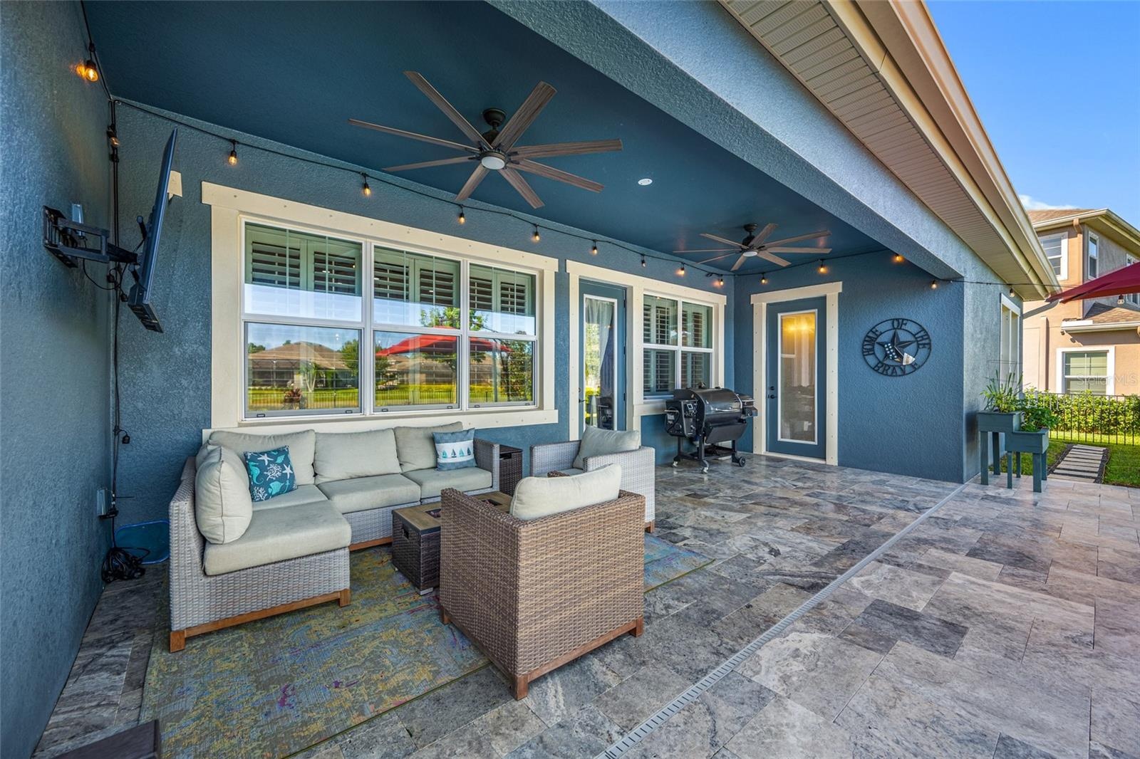 Lanai with stone paver pool deck