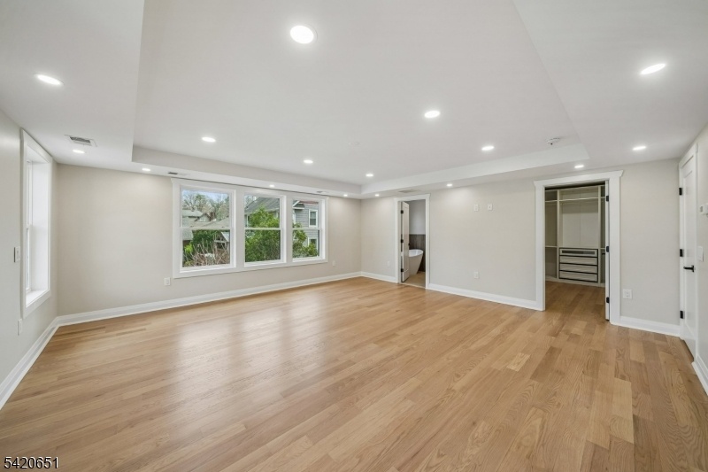 PRIMARY BEDROOM W/Tray CEILING