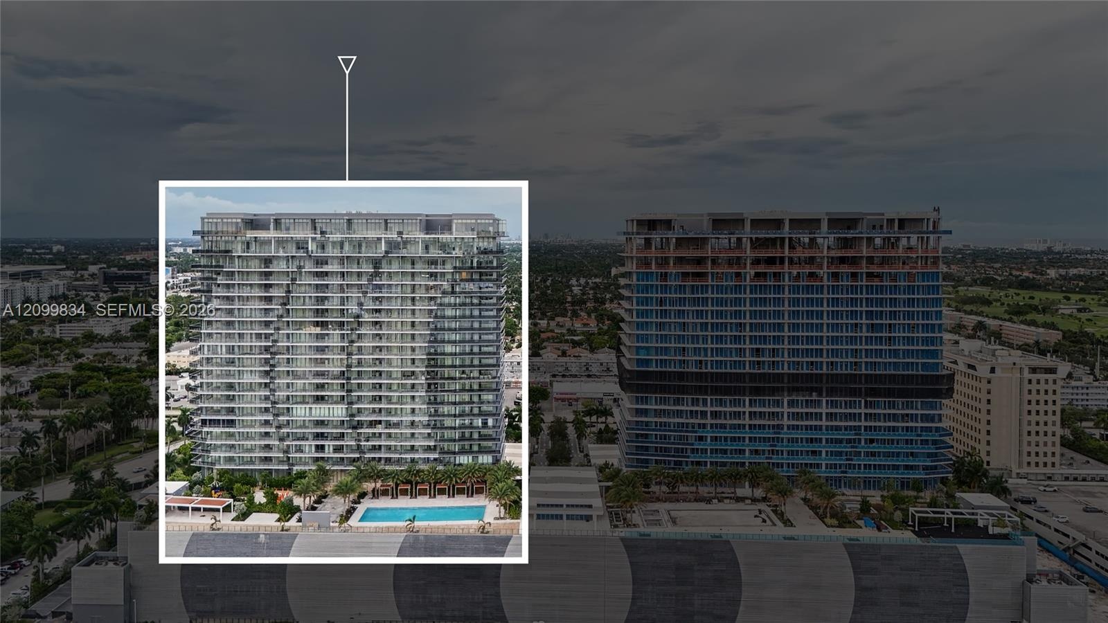 High-rise residential building featuring floor-to-ceiling glass paneling, recessed balconies, and a ground-level swimming pool with surrounding deck a