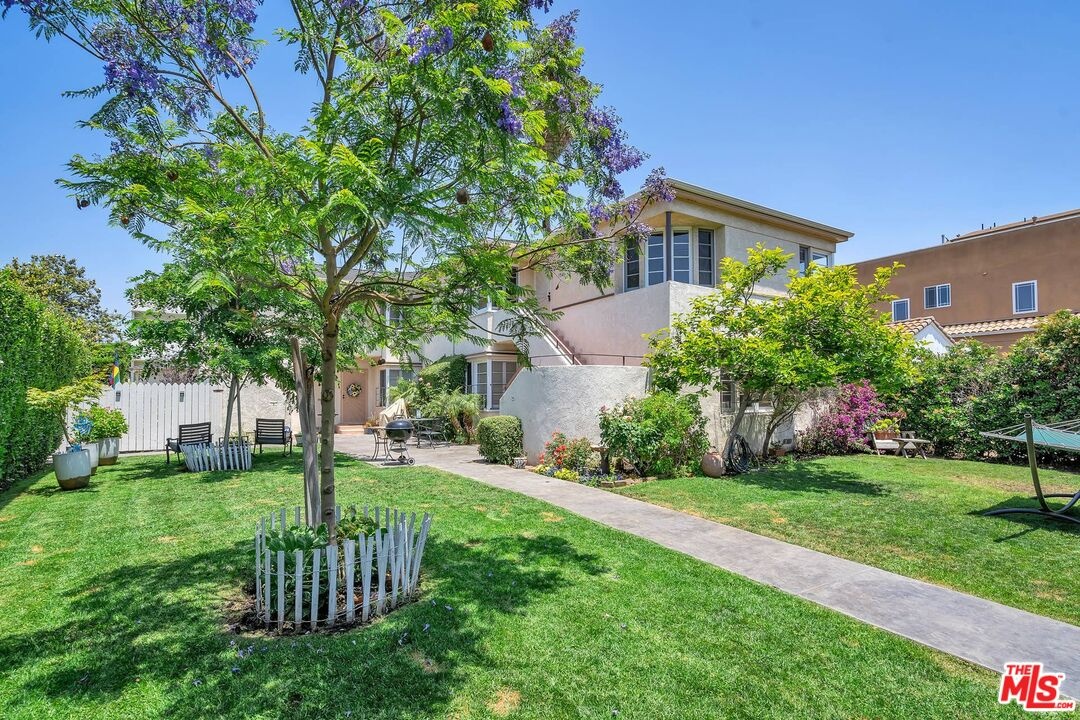 Mature trees and open lawn