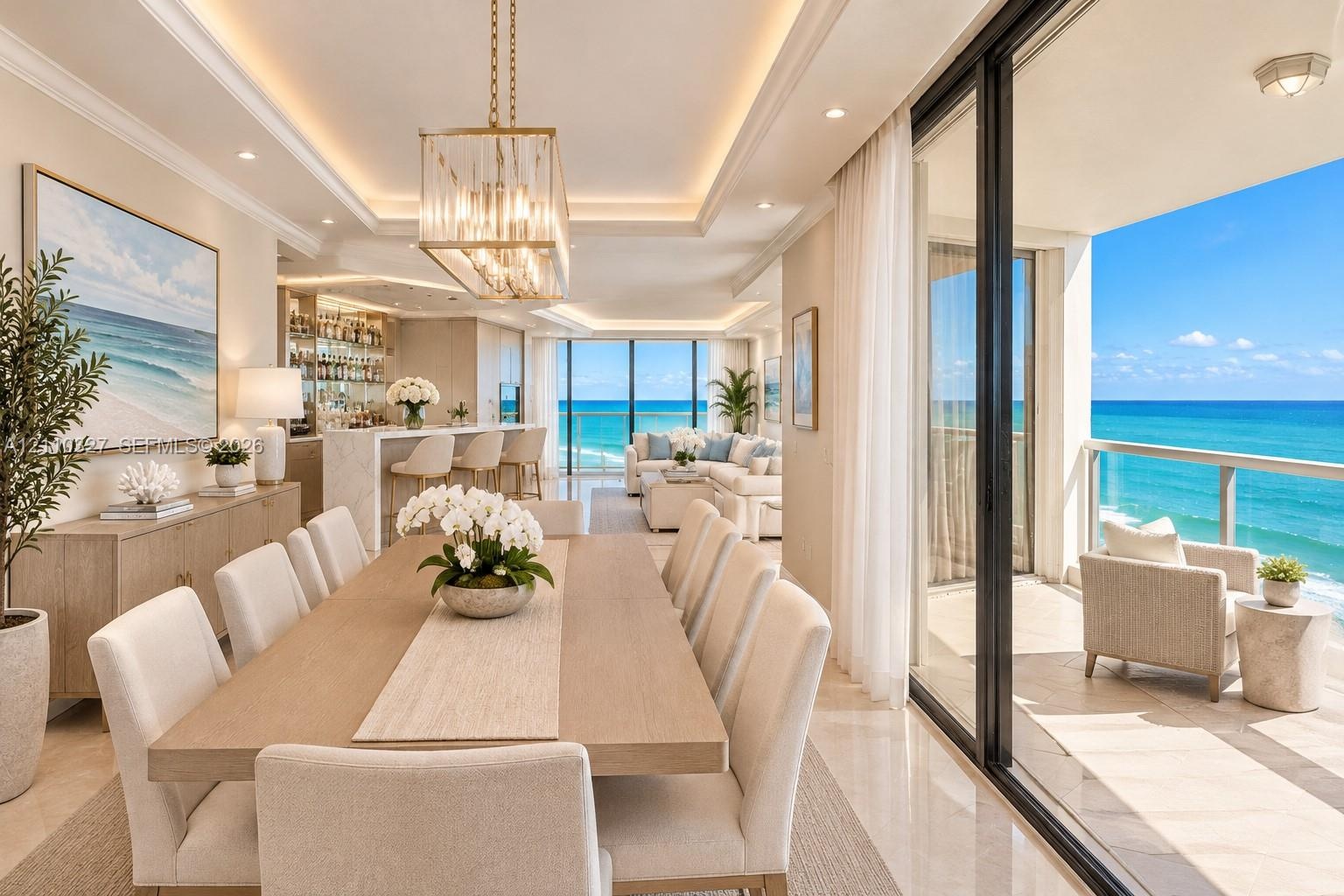 Kitchen featuring light-toned cabinetry, stone-finish countertops, stainless steel appliances, tile backsplash, and tile flooring