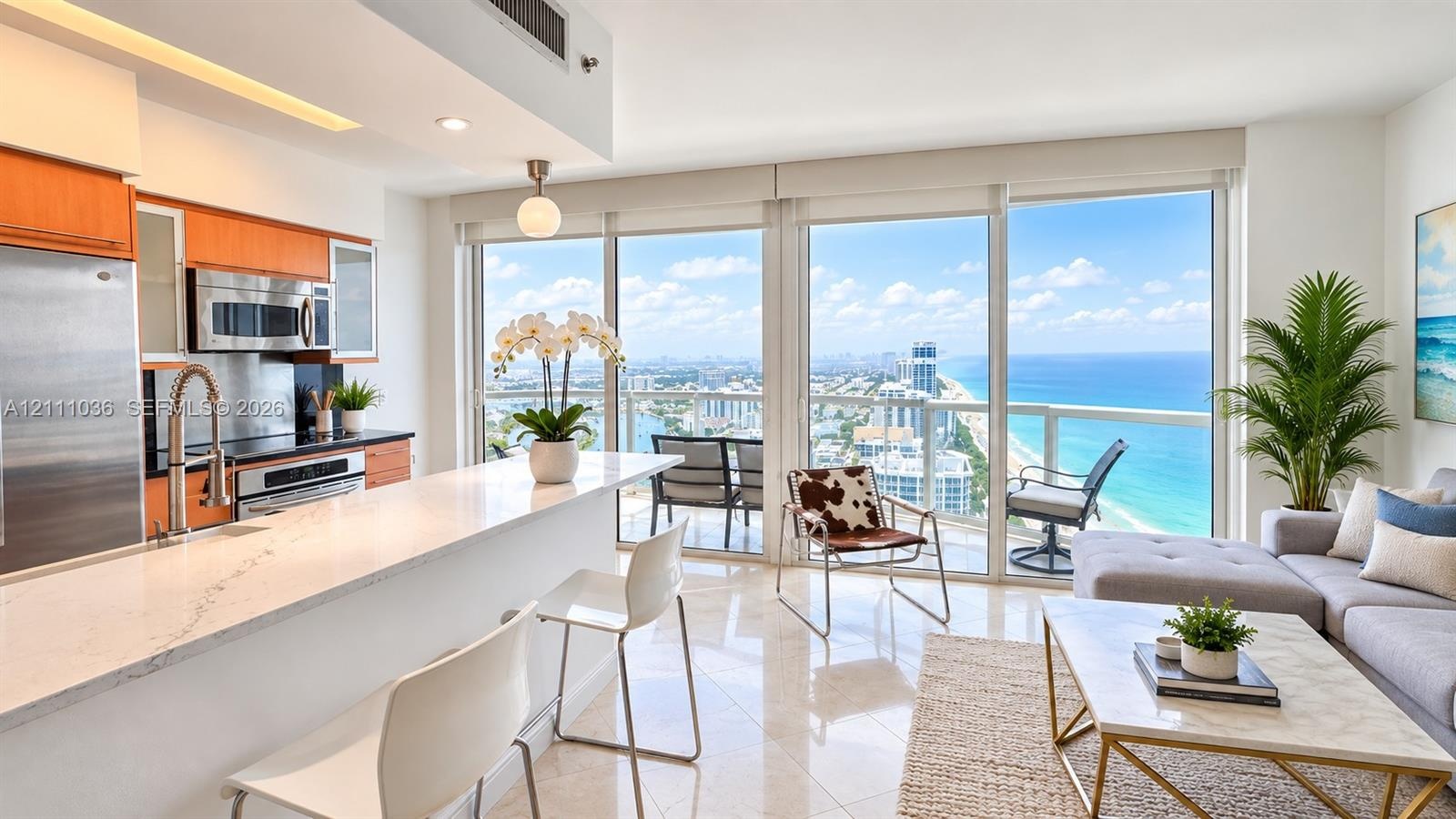 Kitchen featuring stone-surface countertops, wood-finish cabinetry, stainless steel appliances, and tile flooring, with floor-to-ceiling glass panelin