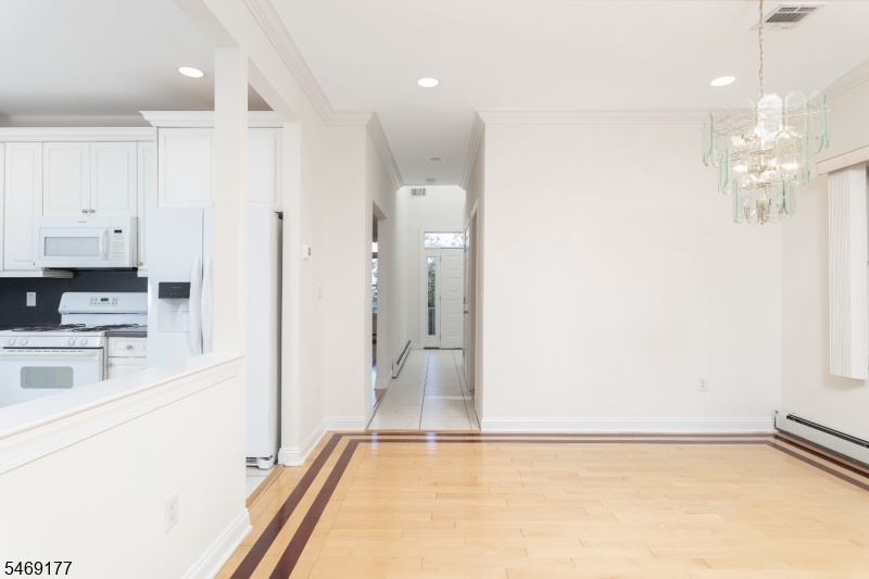 REAR ROOM VIEW TO FRONT FOYER