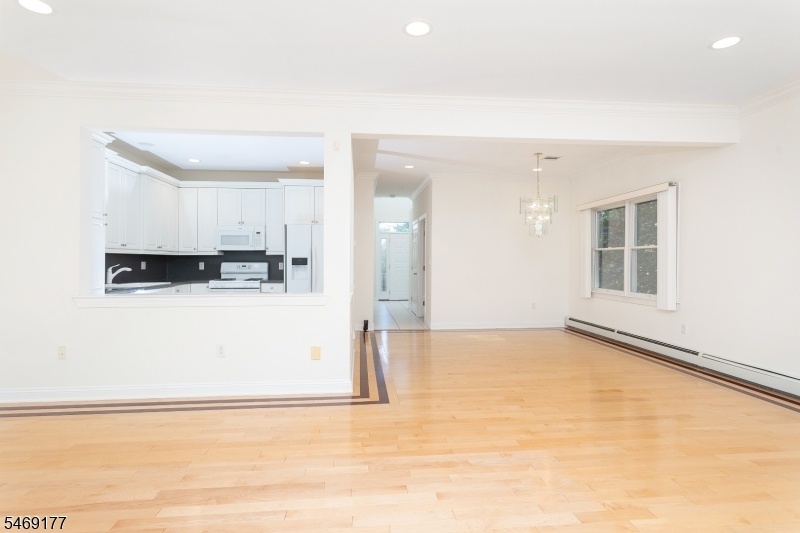 LIVING ROOM VIEW TO DINING RM