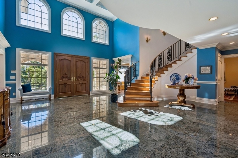 Foyer and Custom Carved Doors