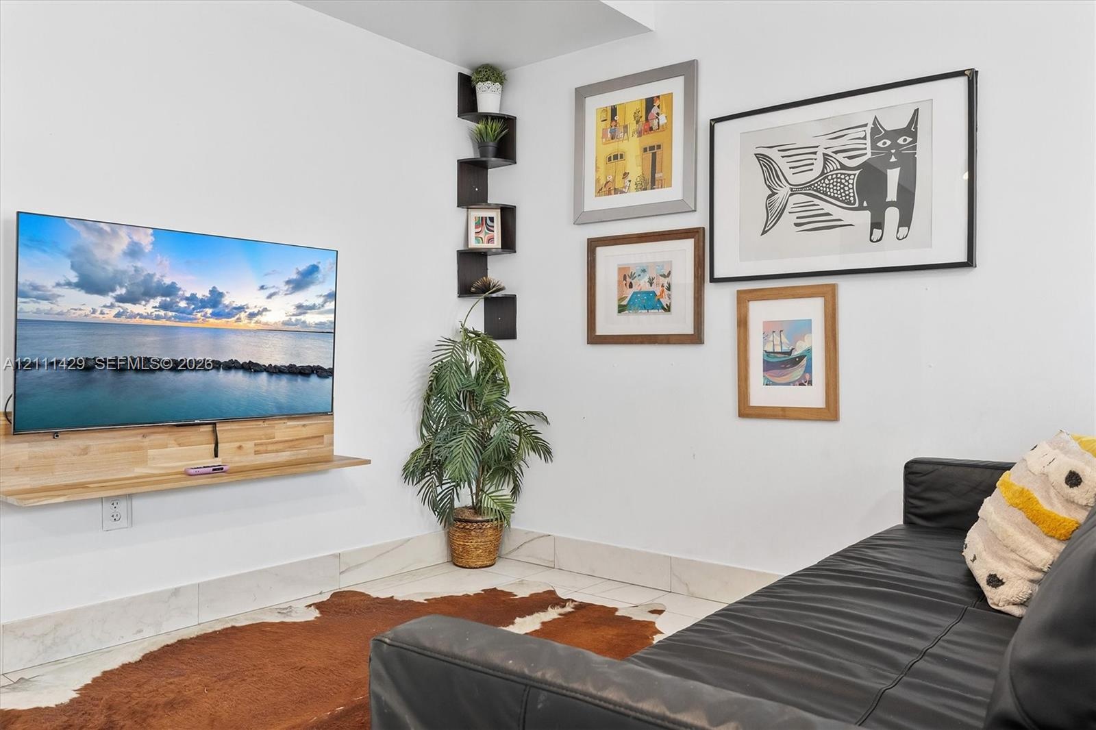 Wall-mounted light-wood floating shelf and black corner shelving unit, featuring white stone-finish tile flooring