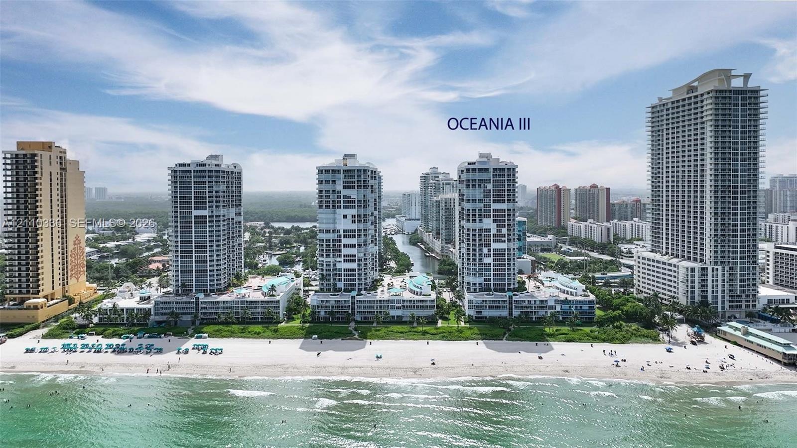 High-rise oceanfront towers featuring direct beach access, coastal proximity, and extensive landscaped grounds