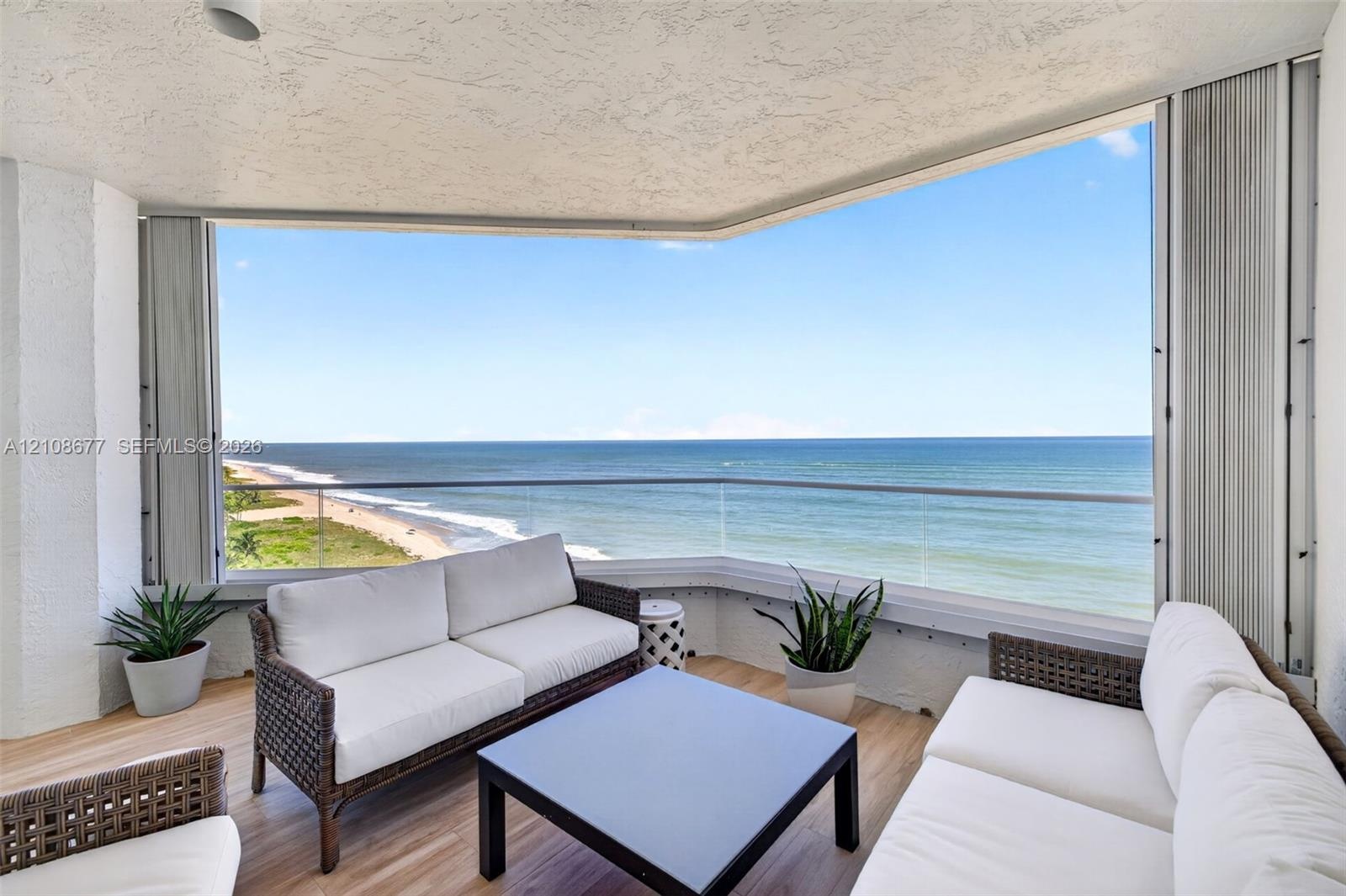 Ocean views. Additional balcony protection for your furniture with upgraded accordion shutters.