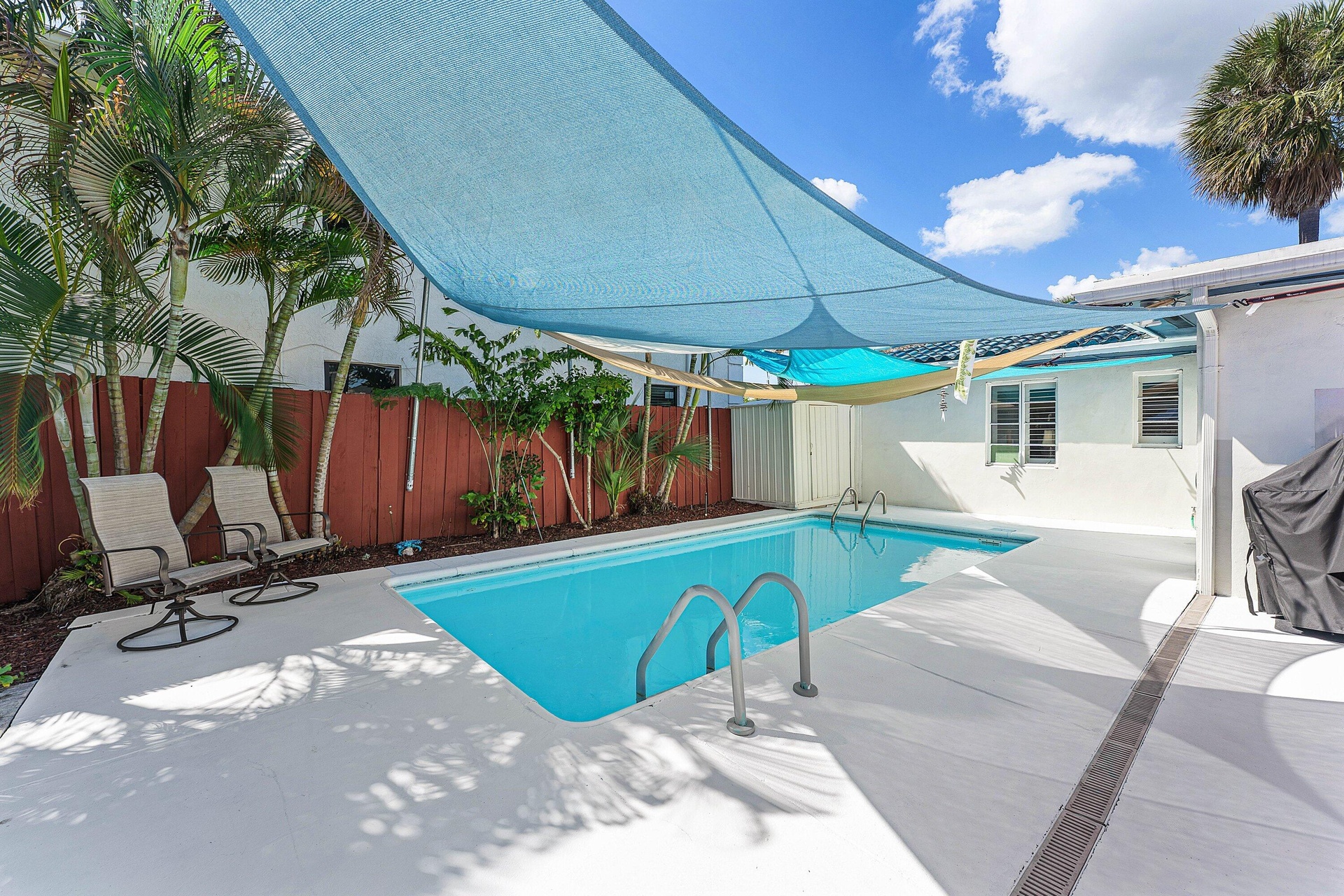 Patio with salt pool, outdoor bathroom and sauna