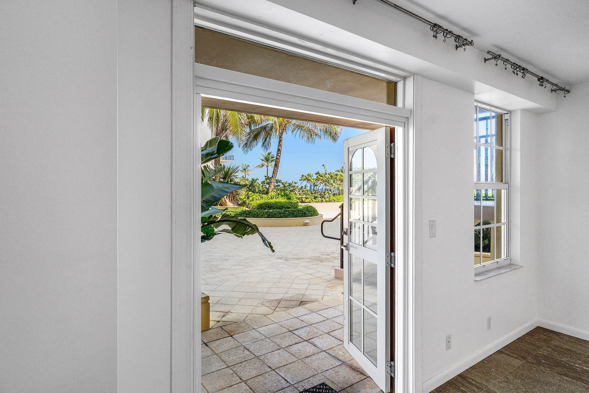 French Doors to patio, beach and Pool