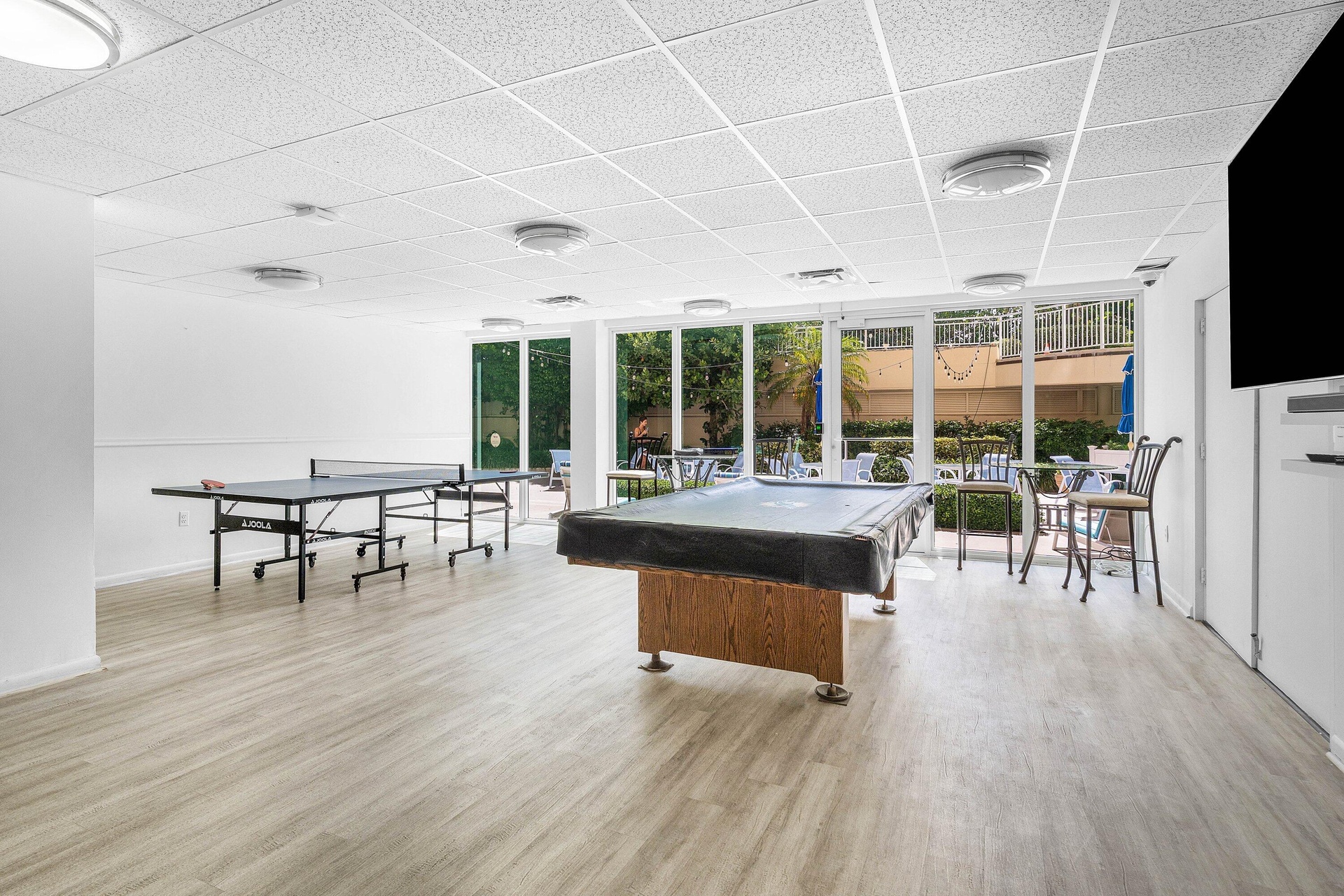 Recreation room and saunas by pool Baths & lockers