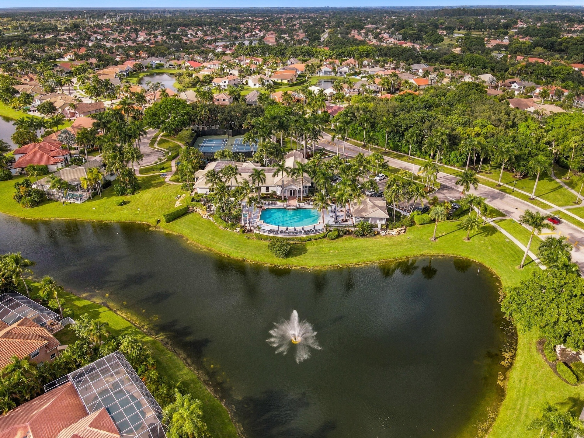 Aerial perspective highlighting the picturesque lakes and waterways throughout the community.